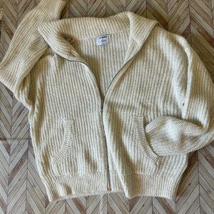 Old Navy, cropped, zip-up white sweater.